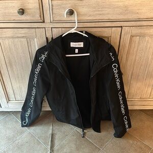 calvin klein jacket with hood. Wind breaker. Good for a rain day.  Worn oncd